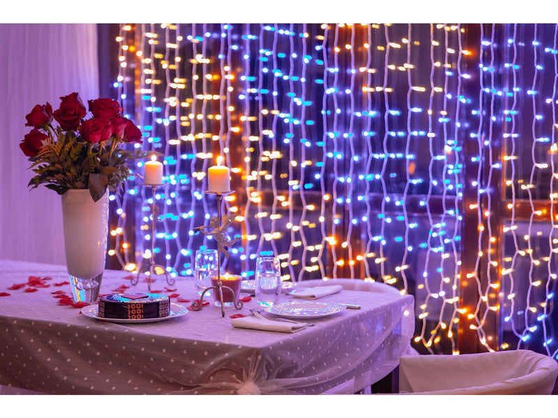 Twinkly Curtain – 210 App-Controlled 210 RGB + Warm White LEDs. 1.5 x 2.1 Meters. Clear Wire.