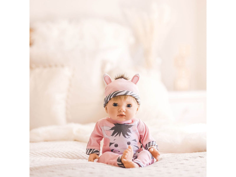 Tiny Treasures Doll with blond hair and Zebra outfit.