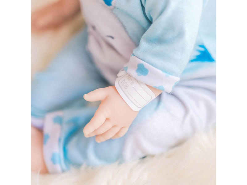 Tiny Treasures Doll with blond hair and blue Hippo outfit