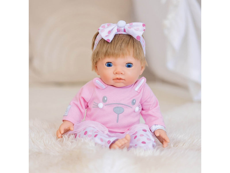 Tiny Treasures Doll with blonde hair and pink outfit