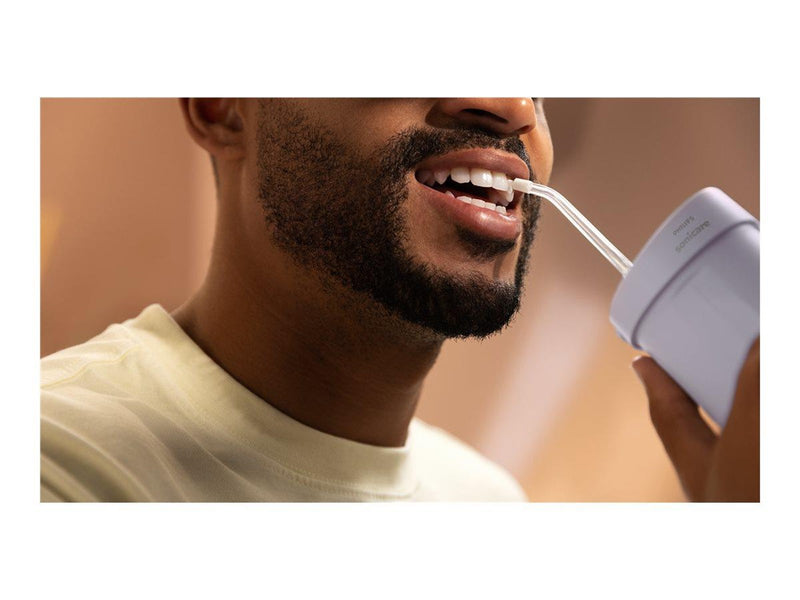 Philips Elektrische Zahnbürste Sonicare Compact Flosser 1000 HX3333 - oral irrigator - purple