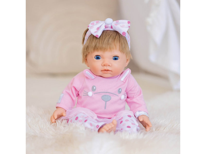 Tiny Treasures Doll with blonde hair and pink outfit